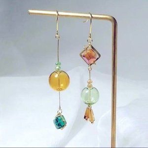 Asymmetrical dangle earrings spherical celestial blue gold orange teal drop boho